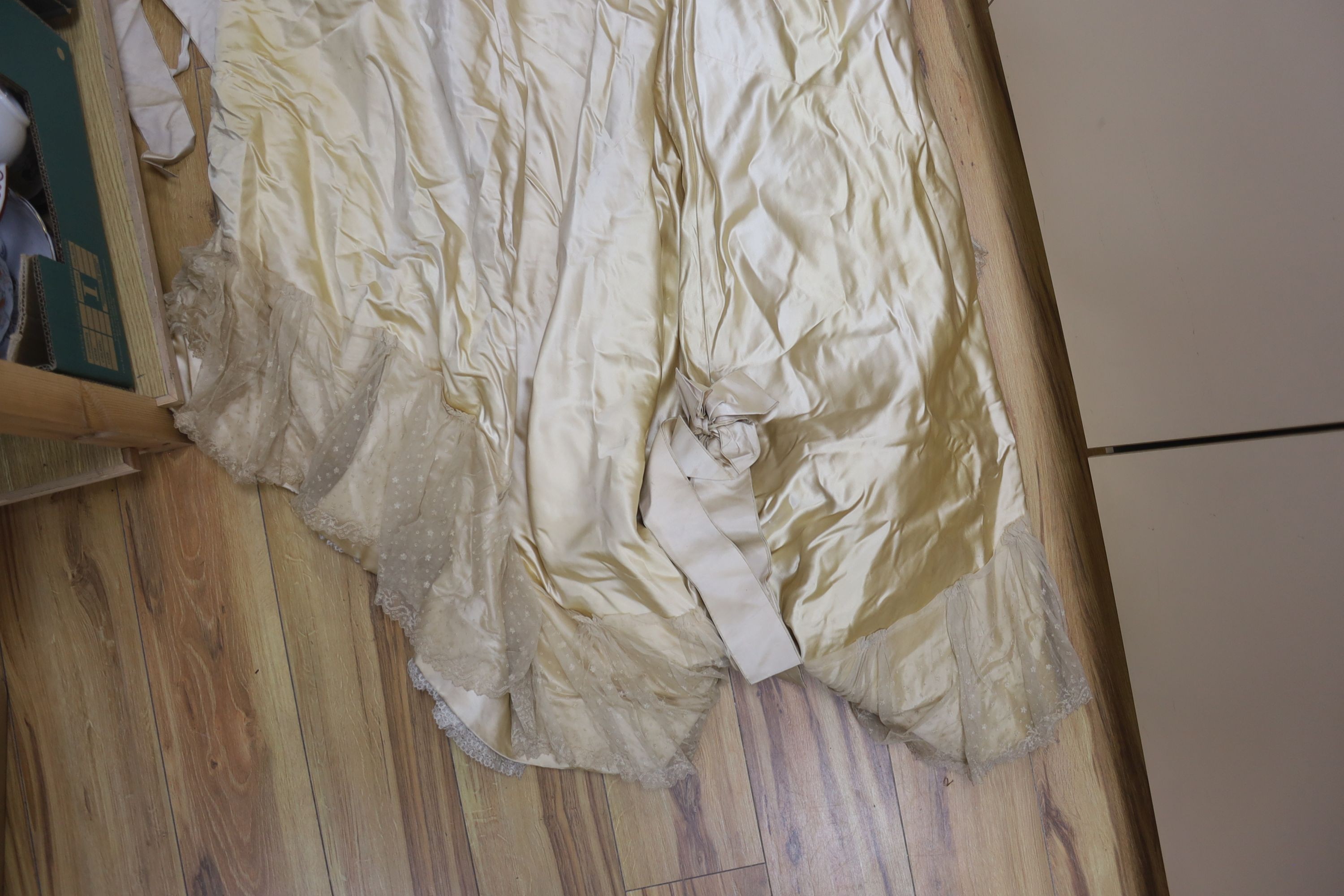 A Firth and Russell cream satin and lace wedding dress